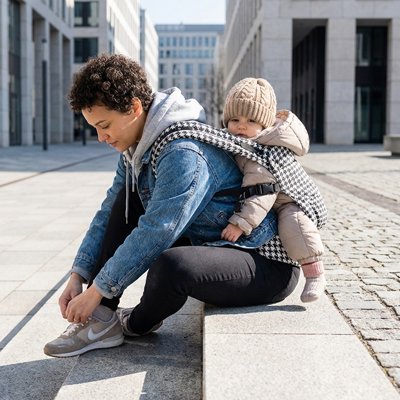 Porte bebe polyvalent noir et blanc