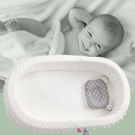 lit bébé blanc